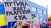 CANADA – Demonstrators with yellow and blue Ukraine flags and anti-war signs near Russian consulate in Toronto ask to close the airspace over Ukraine during the war. Toronto, Canada, March 6, 2022 