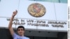 Armenia -- Vahagn Gevorgian, a member of opposition youth movement 'Hima' ('Now') in front of the court building, 12Sep2009