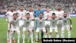 Iran soccer players pose for a team photo at the Asian Cup tournament in the United Arab Emirates.