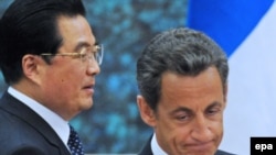 China's President Hu Jintao (left) and his French counterpart Nicolas Sarkozy are expected to sign deals worth billions.