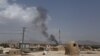 Smoke rises into the air after Taliban militants launched an attack on the Afghan provincial capital of Ghazni, August 10, 2018