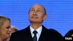 Президент России Владимир Путин на митинге в честь годовщины "присоединения" Крыма к России. Москва, 18 марта 2015 года.