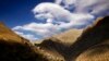 Clouds over a village in the mountainous borderlands with Iraq, near the site where three American hikers were arrested in 2009