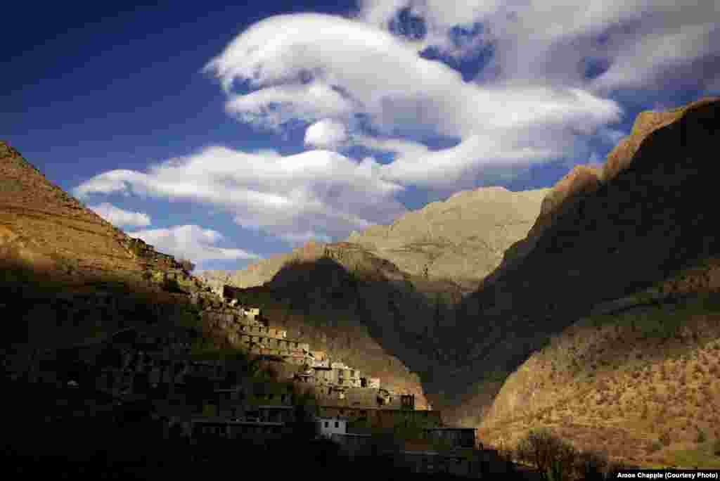 Clouds over a village in the mountainous borderlands with Iraq, near the site where three American hikers were arrested in 2009