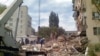 Разбор завалов на месте обрушения двух подъездов в здании общежития в Астрахани 
