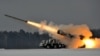 Belarus -- An army Smerch (Tornado), Soviet-made heavy multiple rocket launcher, fires during exercises in the Brest region, 25Jan2011