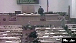 Armenia - A screenshot of TV footage of gunmen opening fire in the Armenian parliament on 27 October, 1999.