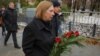 The U.S. ambassador to Russia, Lynne Tracy, lays flowers at the Solovetsky Stone to remember the victims of political repression, in Moscow on October 29.
