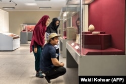 Chinese tourists in the Kabul Museum in April 2025.