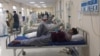آرشیف- شماری از افراد مبتلا به ویروس کرونا در شفاخانه افغان‌جاپان