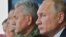 Президент России Владимир Путин и министр обороны РФ Сергей Шойгу (справа налево) наблюдают за ходом основного этапа стратегических командно-штабных учений "Кавказ-2020" на полигоне Капустин Яр, сентябрь 2020 г.