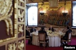 Photos of a pre-parade informal breakfast for the eight national leaders suggested Japarov had not attended.