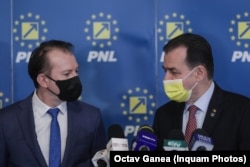 Premierul Cîțu și președintele în funcție al PNL, Ludovic Orban, își dispută supremația în partid