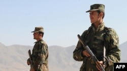 Afghan National Army soldiers keep watch in Kabul.