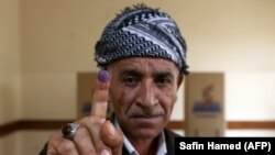 Чоловік після голосування на референдумі, Ербіль, столиця автономного округу Іракський Курдистан, Ірак, 25 вересня 2017 року