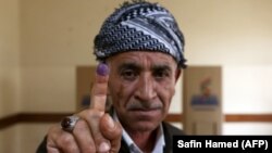 Чоловік після голосування на референдумі, Ербіль, столиця автономного округу Іракський Курдистан, Ірак, 25 вересня 2017 року