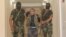 Azerbaijan - Azerbaijan soldiers escort Karen Petrosian, an Armenian man arrested after crossing into Azerbaijan, 7Aug2014 