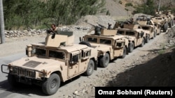 AFGHANISTAN -- Afghan Commando forces armoured convoy leaves toward the front line, at the Ghorband District, Parwan Province Afghanistan June 29, 2021. 