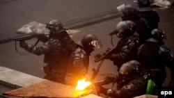 Співробітники спецпідрозділу «Беркут» у центрі Києва, лютий 2014 року