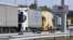 Trucks wait on the border between Serbia and North Macedonia. "I remember in 2007, when there were three or four vehicles at the border...And now, I think it's never under 50 vehicles," says Serbian businessman Dragan Stojsin. (file photo)