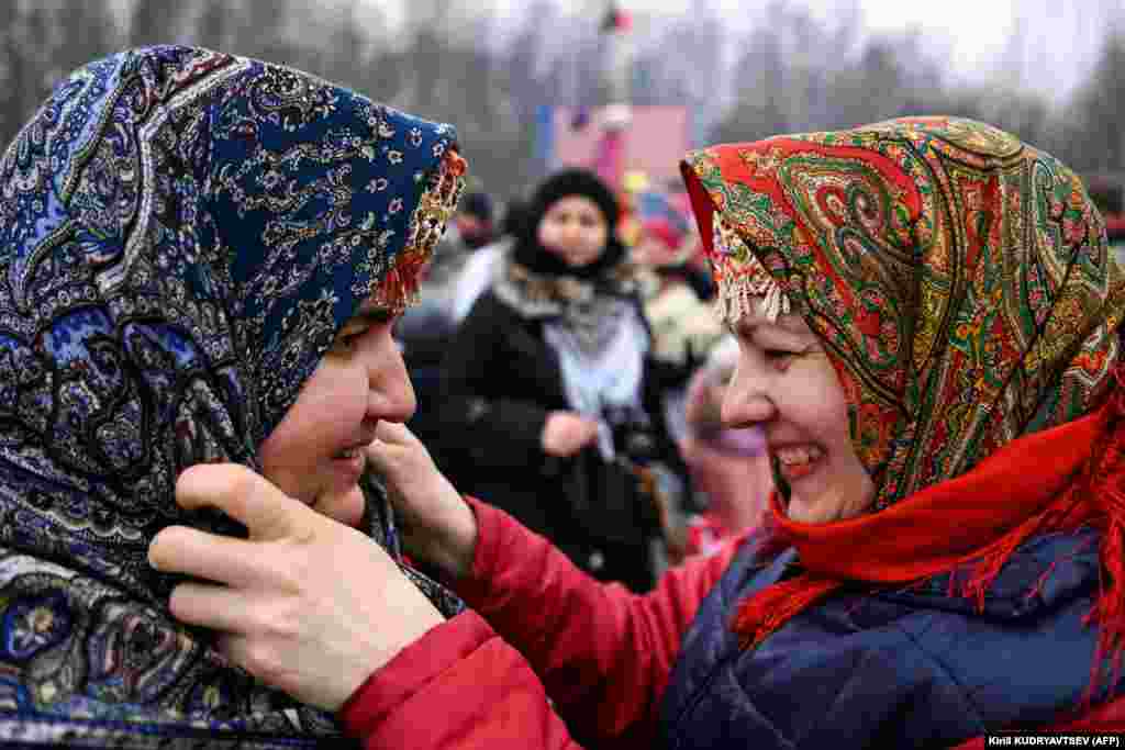 Traditionaly dressed Russian women celebrate Maslenitsa in the village of Gzhel.