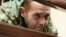 Yuri Budzylo -- seen here at a court hearing in Simferopol -- is one of the 24 Ukrainian sailors detained in Crimea since November.