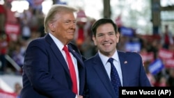 U.S. Secretary of State nominee Marco Rubio (right) with U.S. President-elect Donald Trump (file photo)