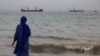 Vessels in the Strait of Hormuz are visible near the beach of Bandar Abbas, Iran. (file photo)