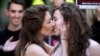 France -- Two women kiss on 23Apr2013 during a pro gay marriage demonstration called by the "oui , oui, oui" (yes, yes, yes) movement outside the French national assembly in Paris.