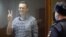 Russian opposition politician Aleksei Navalny at a hearing in Moscow to consider an appeal against an earlier court decision to change his suspended sentence to a real prison term on February 20