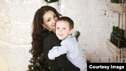 Anastasia Smirnova with her severely epileptic son, Vanya.