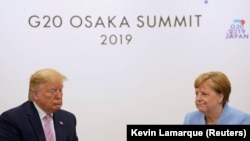 Donald Trump Osakada Angela Merkel ilə görüşür