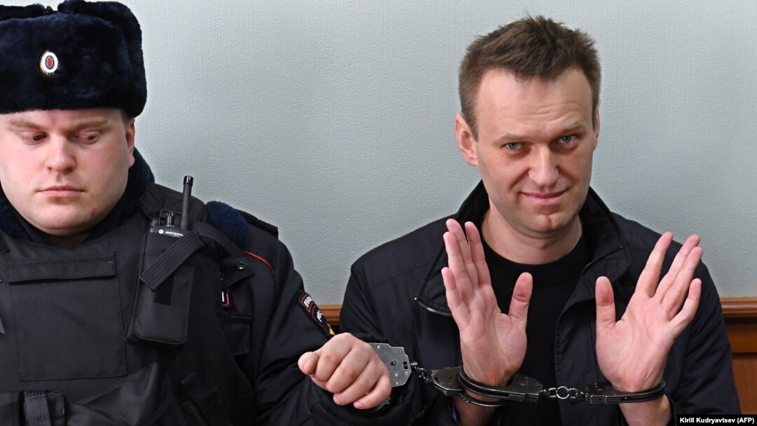 Kremlin critic Aleksei Navalny, who was arrested at a March 26 anticorruption rally, appears at an appeal hearing at a court in Moscow on March 30.