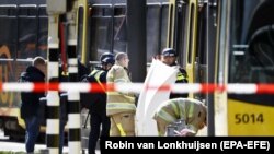 NETHERLANDS -- Emergency services and police forces at the scene where a shooting took place at the 24 Oktoberplace in Utrecht, March 18, 2019