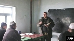 Tajiks study at a local religious school in Gisar in February 2007.