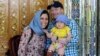 Nazanin Zaghari-Ratcliffe (left) poses with her husband, Richard Ratcliffe, and daughter, Gabriella, in an undated photo.