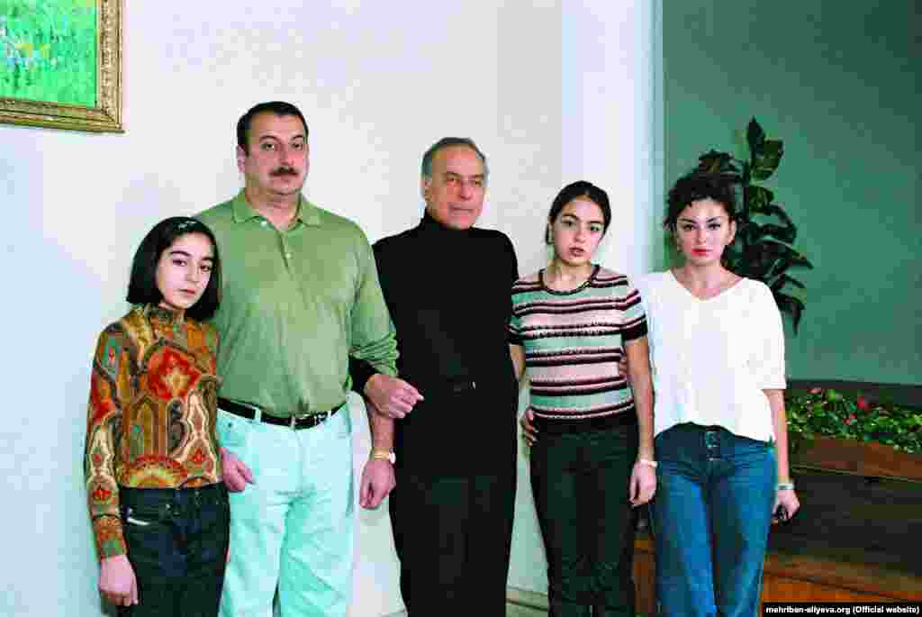 Heydar Aliyev (center) pictured with Ilham, Mehriban (right), and the couple's two daughters, Arzu (left) and Leyla. 