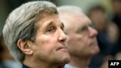 Switzerland -- US Secretary of State John Kerry waits for a meeting with officials from P5+1, the European Union and Iran in Lausanne, March 31, 2015