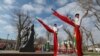 Artists perform near a Soviet-era monument during a celebration of Maslenitsa, also known as Pancake Week, which is a pagan holiday marking the end of winter, in Yevpatoria, Crimea, on March 14.<span> (Reuters/Aleksei Pavlishak)</span>