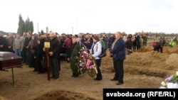 A funeral for one of the victims of the factory explosion in Pinsk on October 27