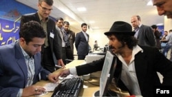 A man registers for the Iran presidential election at the Interior Ministry in Tehran in May. He was one of hundreds who failed to make it through the strict vetting process. Now, a new Internet initiative aims to give voters more choice in a virtual online election.