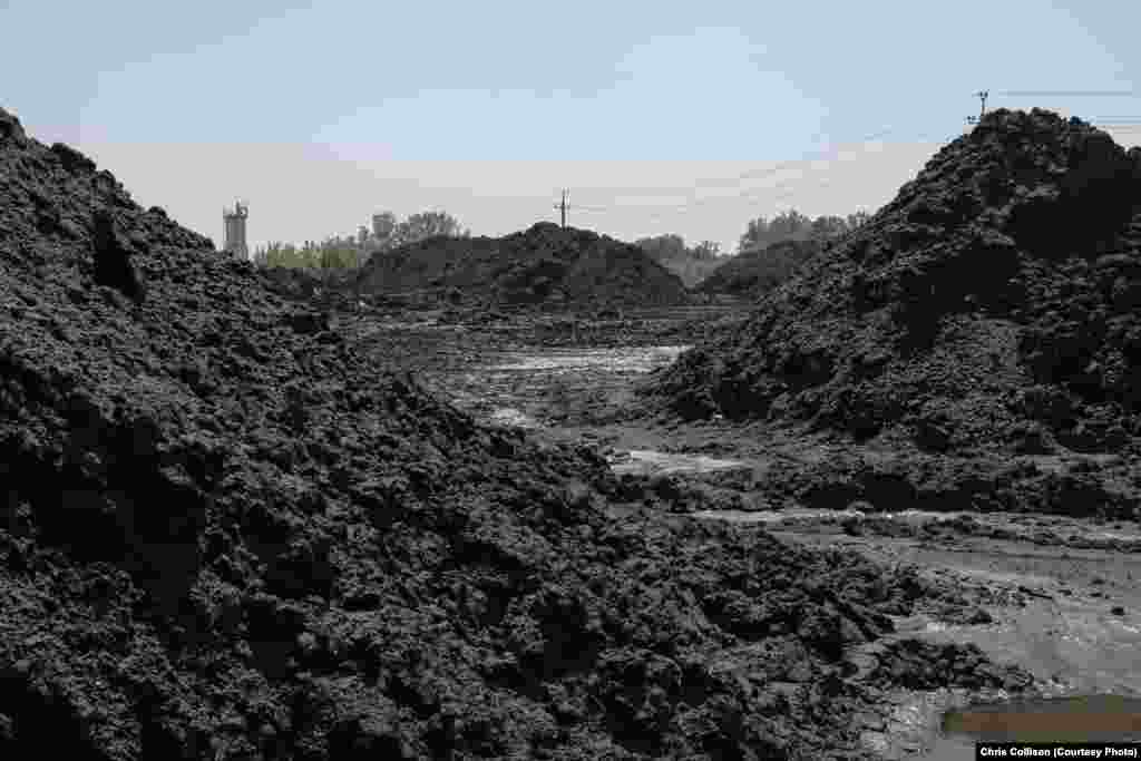 Coal awaits processing at the facility. The government has promised not to import coal in 2016, but the current conflict over salaries has put pressure on domestic production. 
