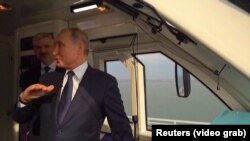 Vladimir Putin în trenul care trece peste strâmtoarea Kerci, 23 decembrie 2019 