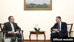 Armenia/Iran - Armenian Prime Minister Tigran Sarkisian (R) meets with Mohammad Reisi, Iran's Ambassador to Armenia, Yerevan,12Feb2014