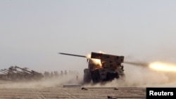 Iraqi soldiers fire a Grad missile during training at the Basmaya military base in Baghdad in November.