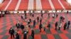 Kosovo - Kosovo Albanians wait in line to cast their votes during Parliamentary elections at a polling station in Pristina, Kosovo, February 14, 2021. 