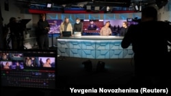 Journalists working in the studio of Radio Free Europe/Radio Liberty (RFE/RL) in Moscow