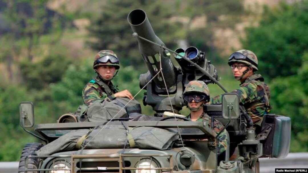North Korean soldiers take part in military exercise near the border village of Panmunjom that separates the two Koreas since the Korean War, in Paju, north of Seoul, North Korea.