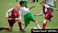Иллюстративное фото - игра детских футбольных команд России и Таджикистана, 6 августа 2012 года.