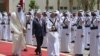 Qatar - The Emir of Qatar, Sheikh Tamim Bin Hamad Al Thani, and Armenian President Serzh Sarkisian inspect a Qatari honor guard at a welcoming ceremony in Doha, 15May2017.